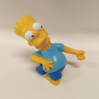 The Simpsons Collectibles - Bart Simpson playing air guitar PVC figure