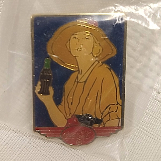 Coca-Cola Collectibles - Lady in Tan with Coke Bottle Enamel Pin or Tie Tack